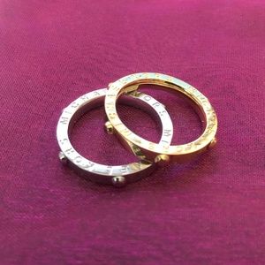 Michael Kors Silver and Gold Screw Rings
